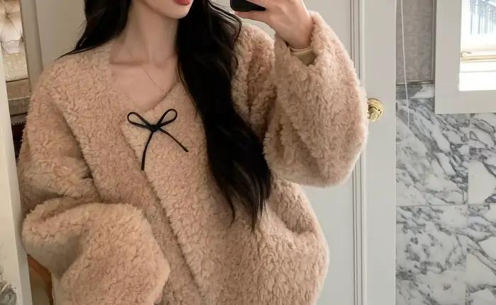 2025 hiver nouveau manteau en cuir femmes agneau noeud ample mode polyvalent manteau