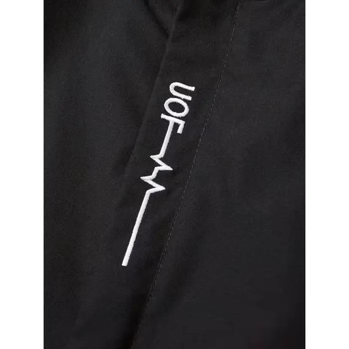 La veste coupe-vent et imperméable est imprimée avec le motif « YAMA » et est de coupe ample, idéale pour les passionnés de moto.