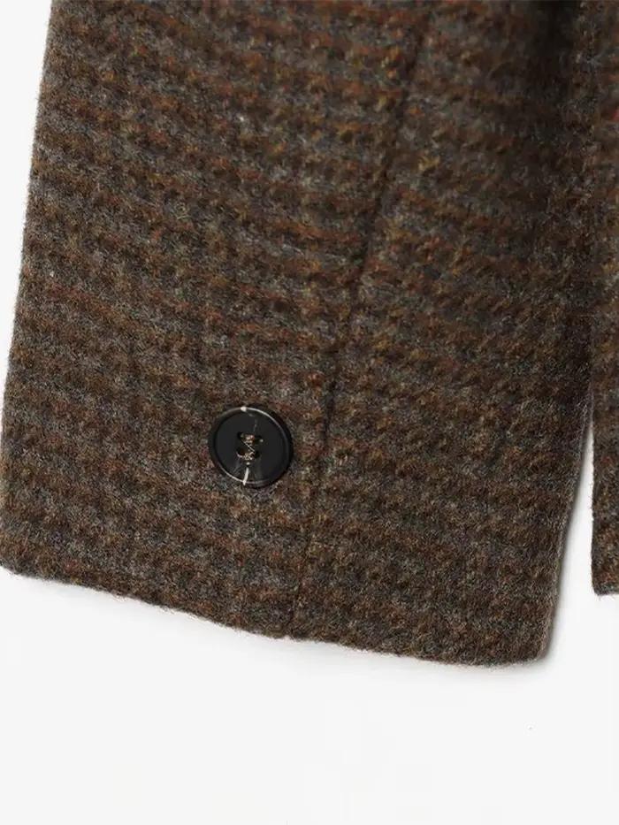 Manteau en laine ample à col montant et empiècements pour femme